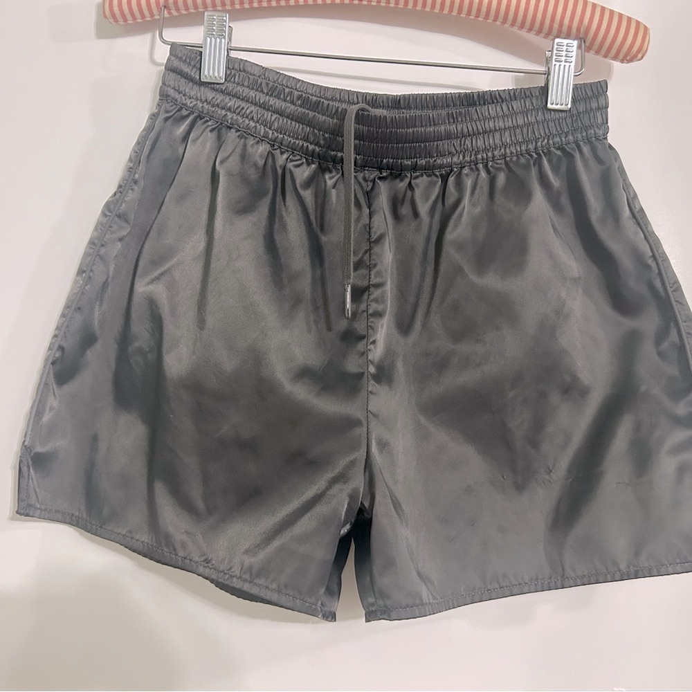 SKIMS Brand New Sport Utility Shorts in the color “gunmetal”
